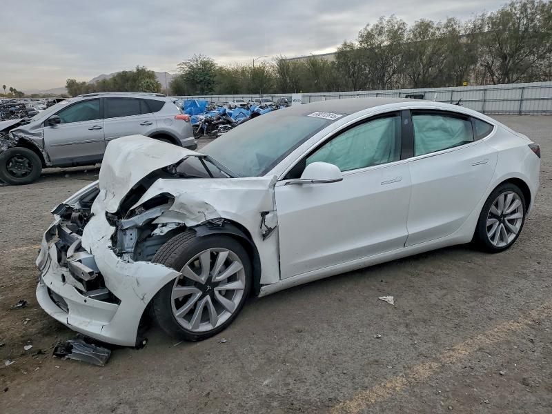 TESLA MODEL 3 2020 with VIN 5YJ3E1EB4LF667674 - Photo from auction