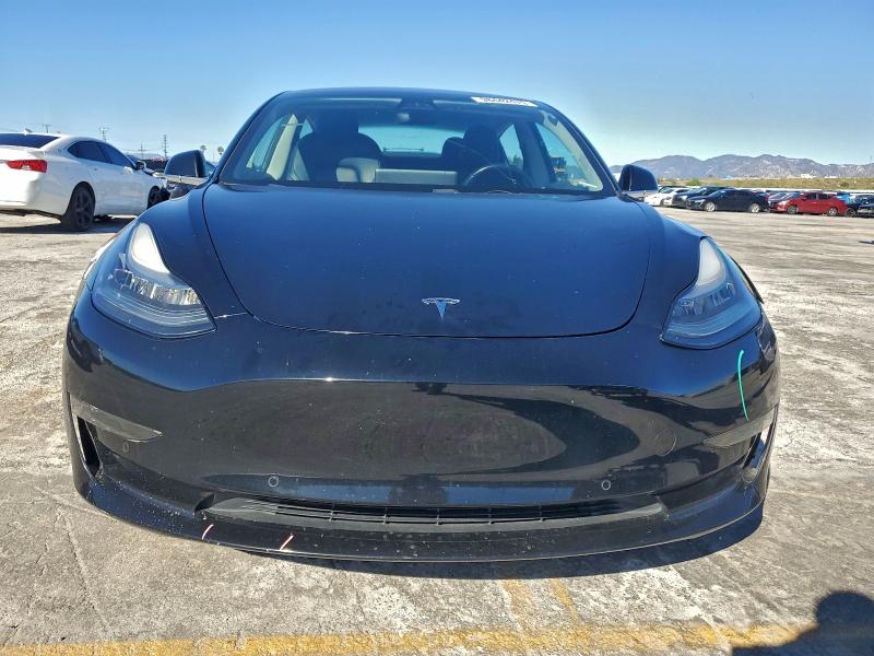 Photo 5 from auction – 2018 TESLA MODEL 3 with VIN 5YJ3E1EA1JF056960