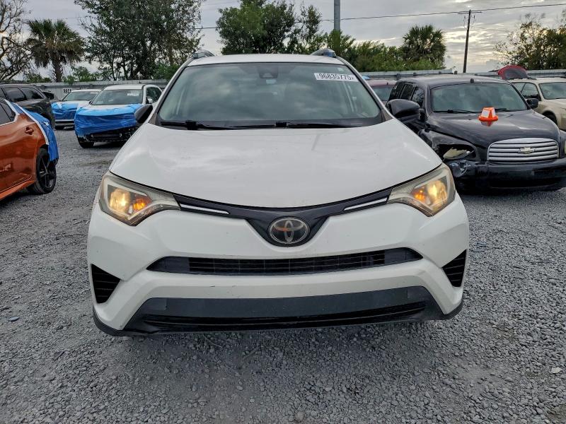 Photo 5 from auction – 2017 TOYOTA RAV4 LE with VIN JTMZFREV6HJ112385