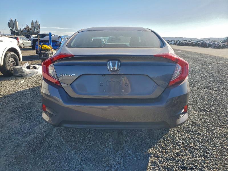 Photo 6 from auction – 2018 HONDA CIVIC LX with VIN 2HGFC2E57JH582291