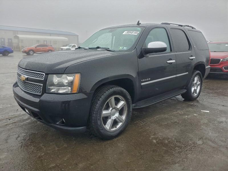 CHEVROLET TAHOE K150 2011 with VIN 1GNSKCE06BR191765 - Photo from auction