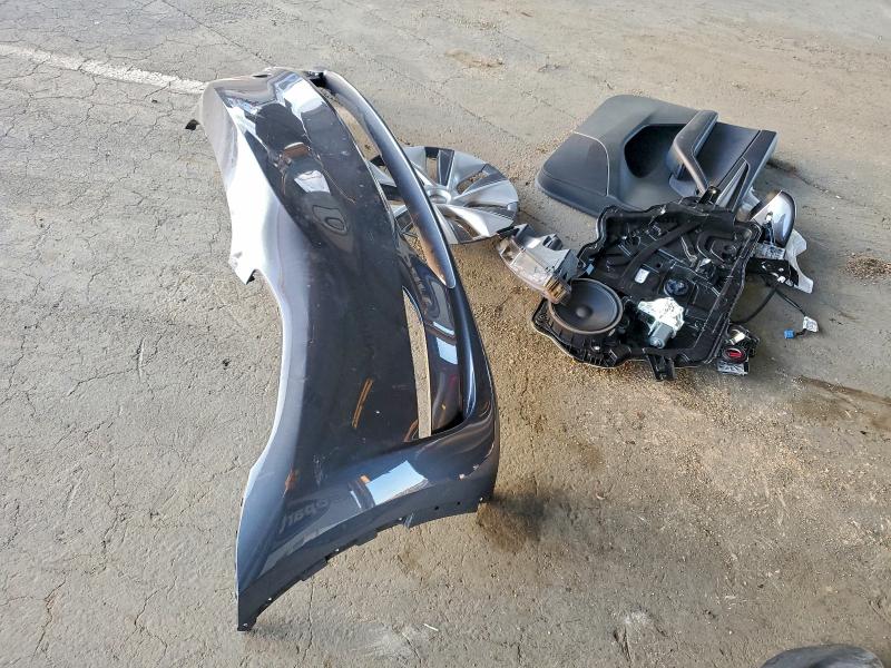 Photo 12 from auction – 2023 TESLA MODEL Y with VIN 7SAYGDEEXPF827528