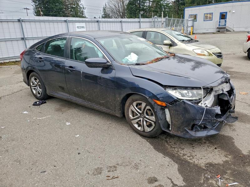 Photo 4 from auction – 2018 HONDA CIVIC LX with VIN 2HGFC2F52JH593309