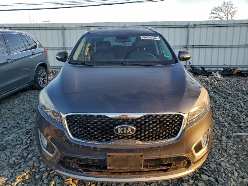 Photo 5 from auction – 2016 KIA SORENTO EX with VIN 5XYPH4A19GG019897