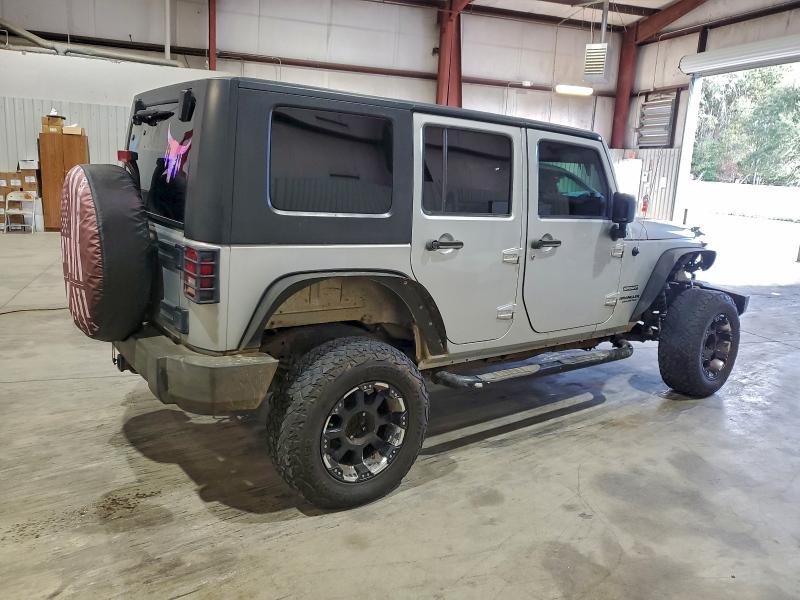 Photo 3 from auction – 2011 JEEP WRANGLER U with VIN 1J4BA3H13BL602858