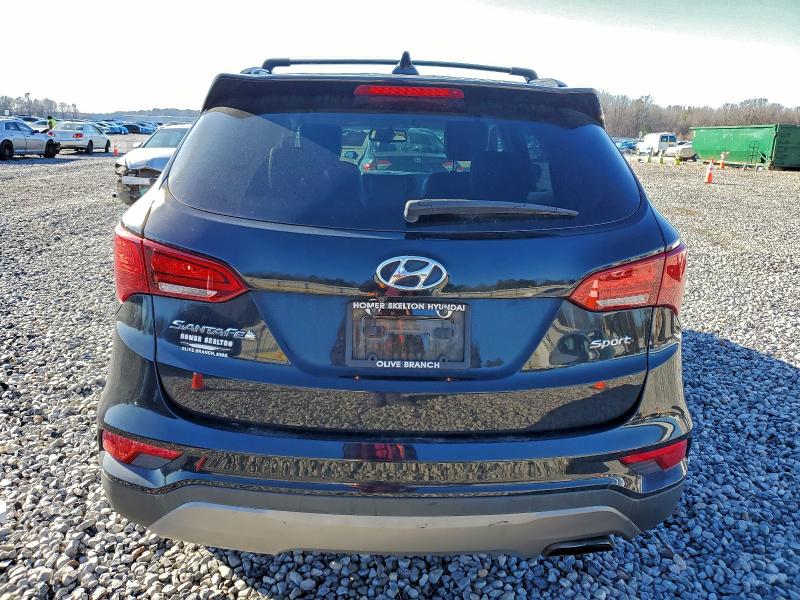 Photo 6 from auction – 2017 HYUNDAI SANTA FE S with VIN 5NMZU3LB0HH012896