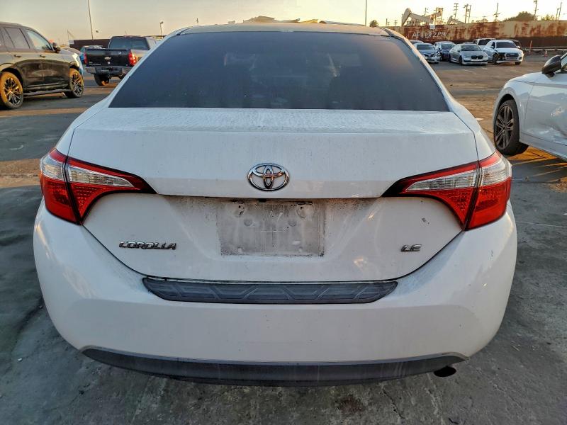 Photo 6 from auction – 2014 TOYOTA COROLLA L with VIN 5YFBURHE0EP008212