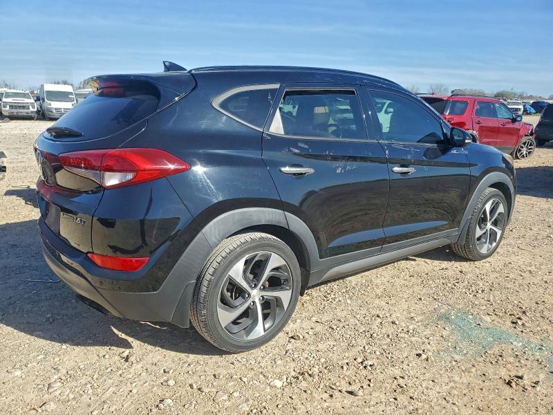 Photo 3 from auction – 2016 HYUNDAI TUCSON LIM with VIN KM8J33A2XGU223075