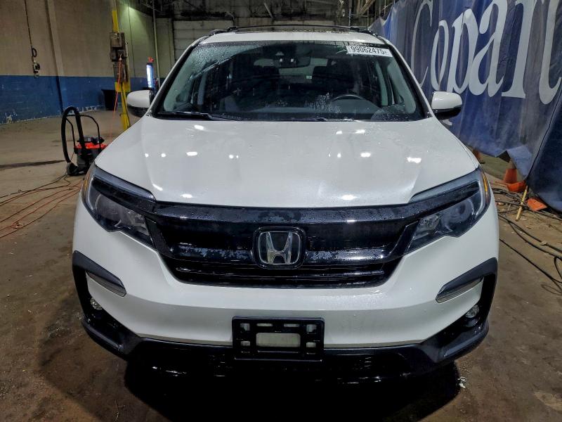 Photo 5 from auction – 2021 HONDA PILOT SE with VIN 5FNYF6H29MB099130
