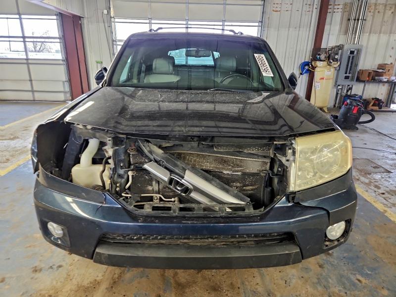 Photo 5 from auction – 2011 HONDA PILOT TOUR with VIN 5FNYF4H95BB011091