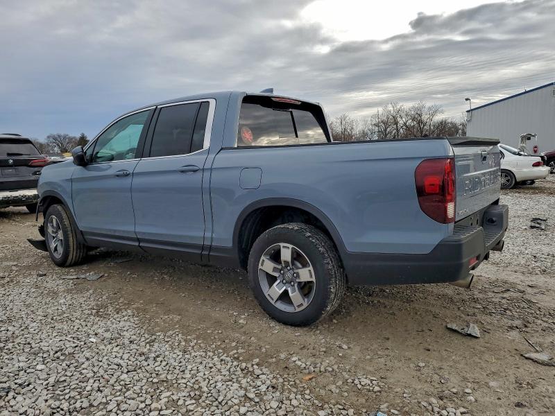 Photo 2 from auction – 2024 HONDA RIDGELINE with VIN 5FPYK3F58RB020830