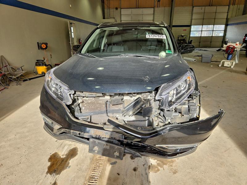 Photo 5 from auction – 2015 HONDA CR-V TOURI with VIN 5J6RM4H96FL062297