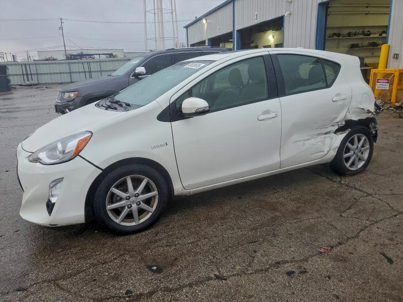 TOYOTA PRIUS C 2016 with VIN JTDKDTB33G1118585 - Photo from auction