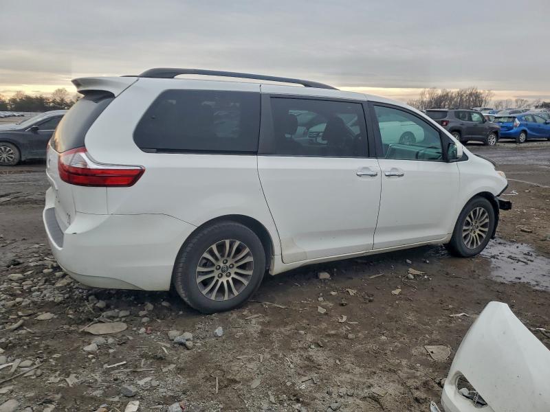 Photo 3 from auction – 2016 TOYOTA SIENNA with VIN 5TDKK3DCXGS694695