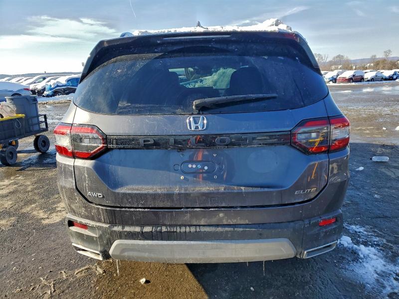 Photo 6 from auction – 2023 HONDA PILOT ELIT with VIN 5FNYG1H88PB023455