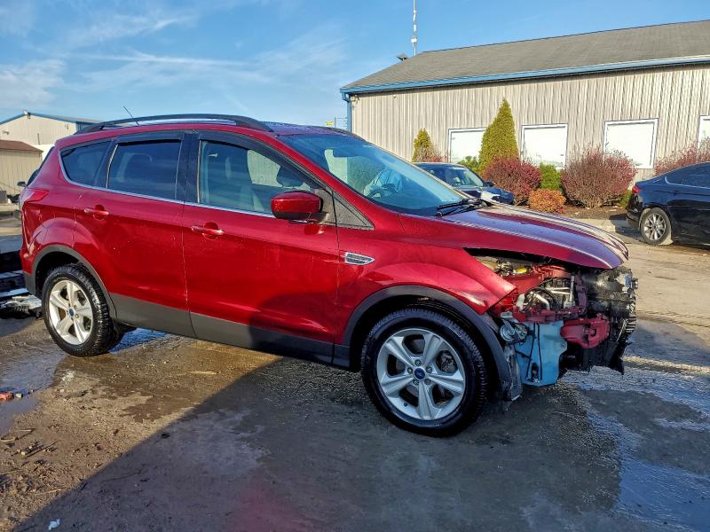 Photo 4 from auction – 2014 FORD ESCAPE SE with VIN 1FMCU9GXXEUD93638