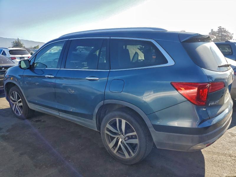 Photo 2 from auction – 2017 HONDA PILOT TOUR with VIN 5FNYF6H90HB004246