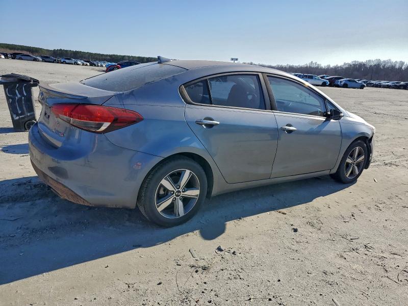 Photo 3 from auction – 2018 KIA FORTE LX with VIN 3KPFL4A76JE266779