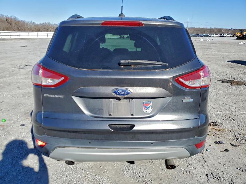 Photo 6 from auction – 2016 FORD ESCAPE SE with VIN 1FMCU9GX2GUC82536