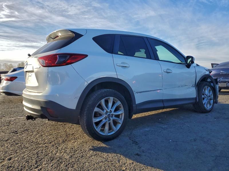 Photo 3 from auction – 2014 MAZDA CX-5 GT with VIN JM3KE4DY0E0392042