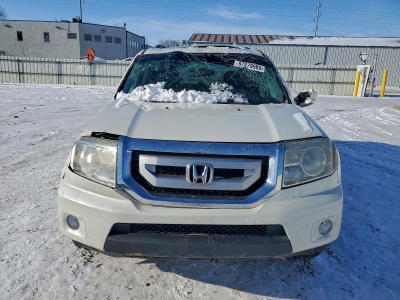 Photo 5 from auction – 2011 HONDA PILOT TOUR with VIN 5FNYF4H98BB073097