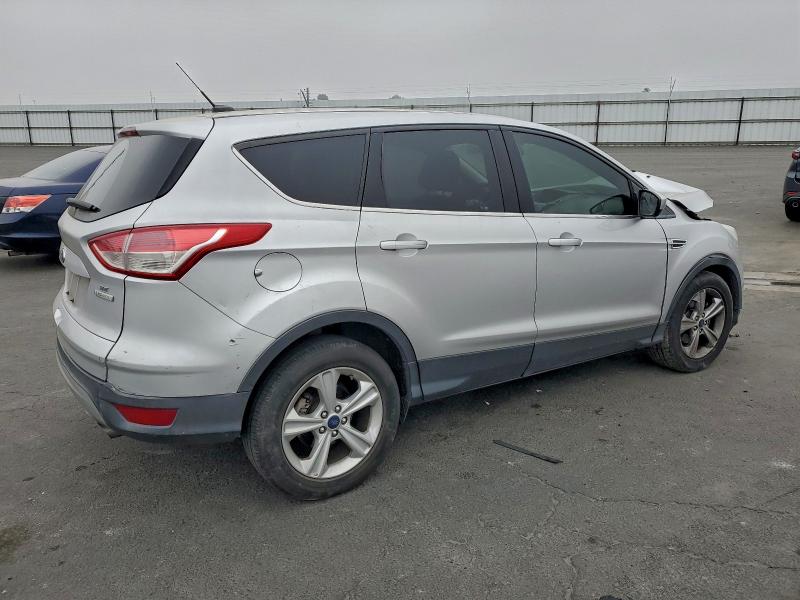 Photo 3 from auction – 2014 FORD ESCAPE SE with VIN 1FMCU0GX7EUE13663
