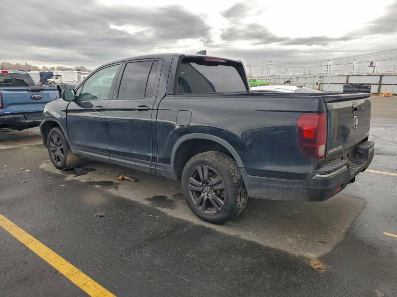 Photo 2 from auction – 2017 HONDA RIDGELINE with VIN 5FPYK3F17HB015906