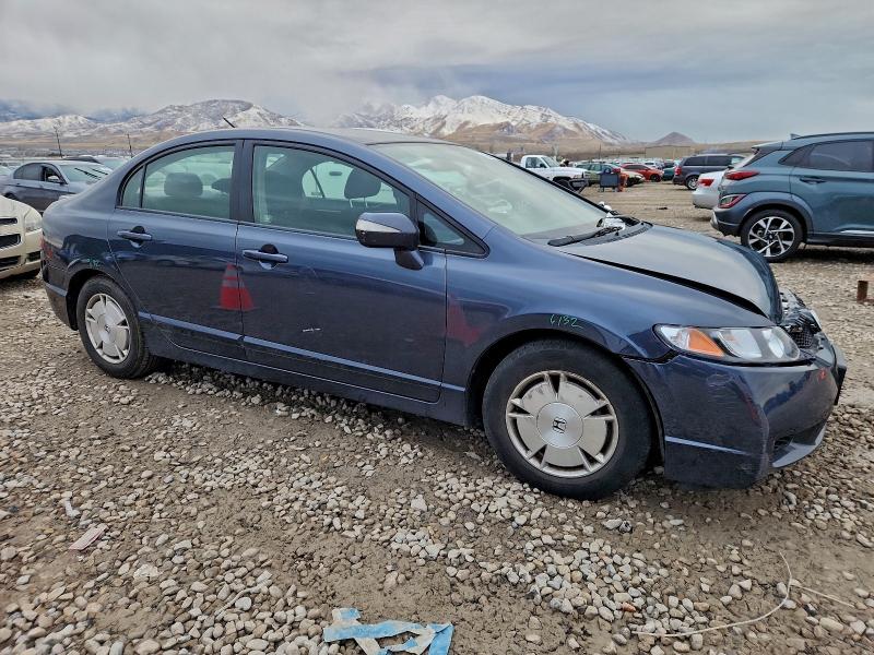 Photo 4 from auction – 2010 HONDA CIVIC HYBR with VIN JHMFA3F28AS002634