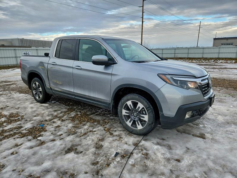 Photo 4 from auction – 2019 HONDA RIDGELINE with VIN 5FPYK3F57KB048012