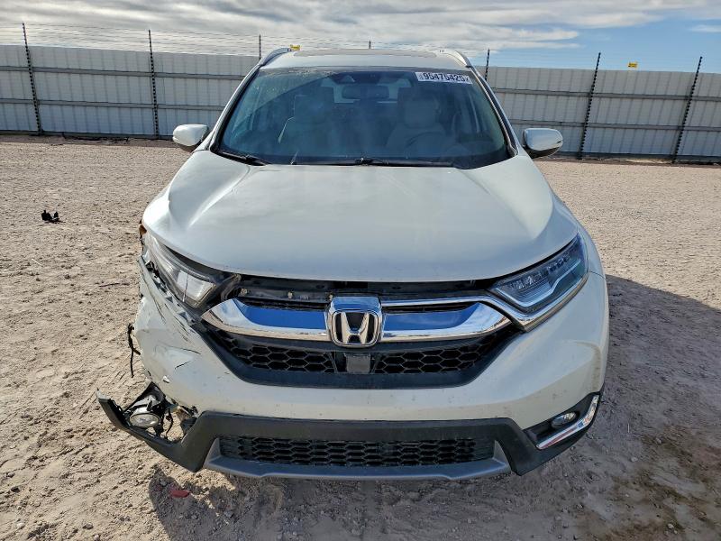 Photo 5 from auction – 2018 HONDA CR-V with VIN 2HKRW2H96JH600997