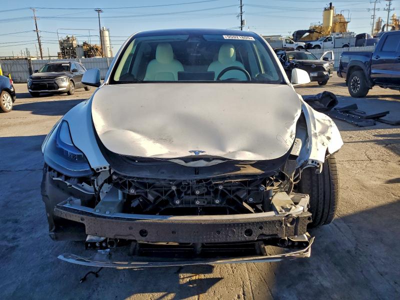 Photo 5 from auction – 2022 TESLA MODEL Y with VIN 7SAYGDEF2NF390436
