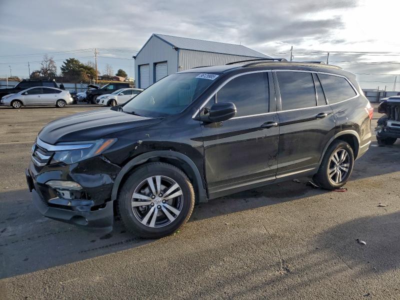 HONDA PILOT EXL 2018 with VIN 5FNYF6H54JB064758 - Photo from auction