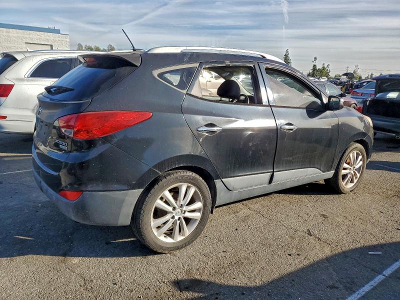 Photo 3 from auction – 2011 HYUNDAI TUCSON with VIN KM8JU3AC1BU130606