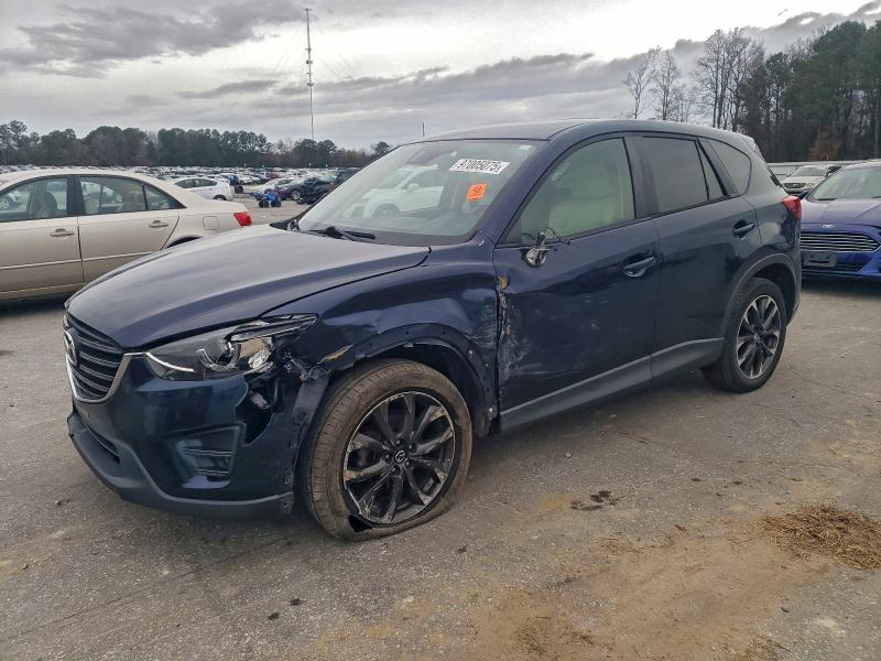 MAZDA CX-5 GT 2016 with VIN JM3KE2DYXG0839399 - Photo from auction