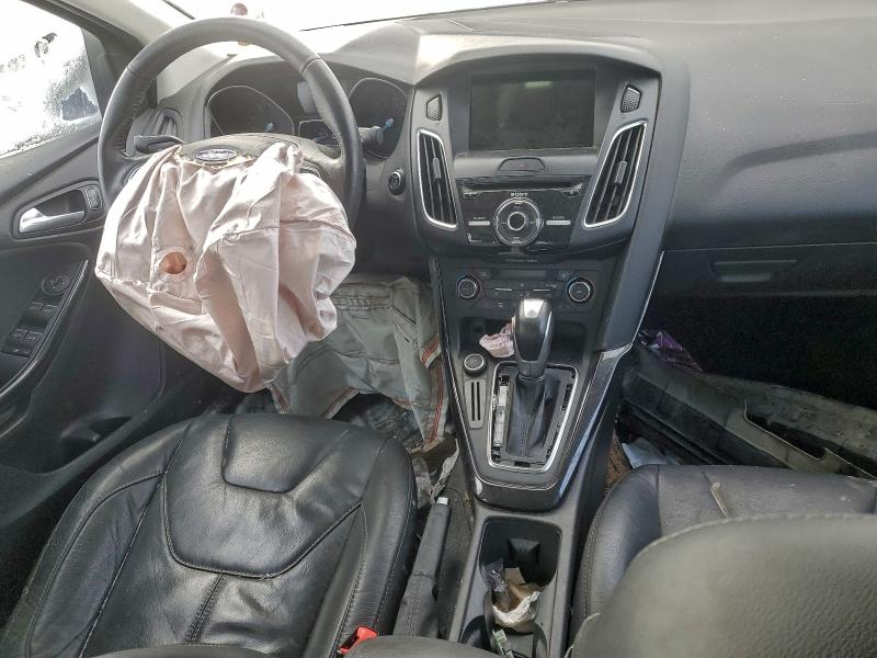 Photo 8 from auction – 2016 FORD FOCUS TITA with VIN 1FADP3J24GL303652