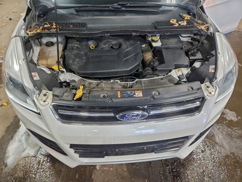 Photo 12 from auction – 2014 FORD ESCAPE TIT with VIN 1FMCU0J90EUD99132