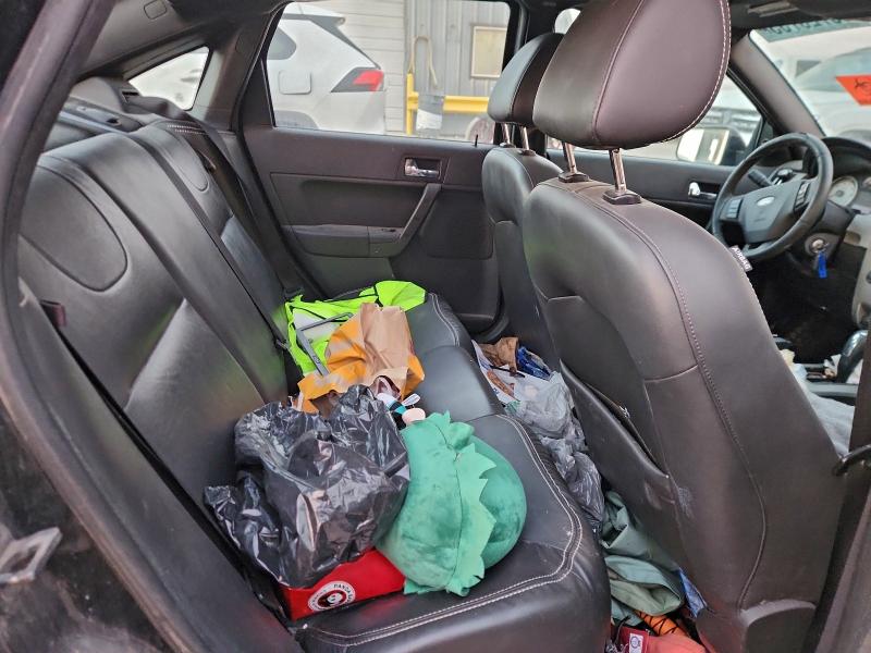 Photo 10 from auction – 2008 FORD FOCUS with VIN 1FAHP35NX8W176427