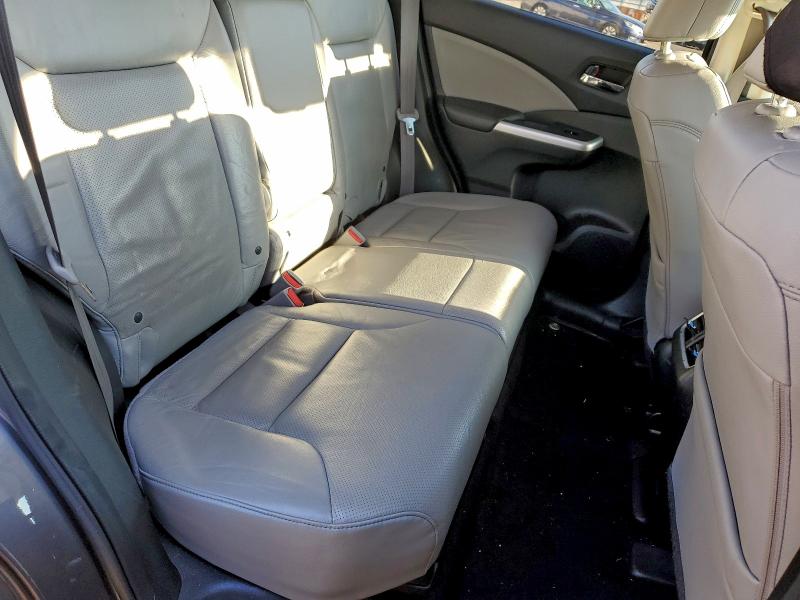 Photo 11 from auction – 2016 HONDA CRV with VIN 5J6RM4H98GL079863