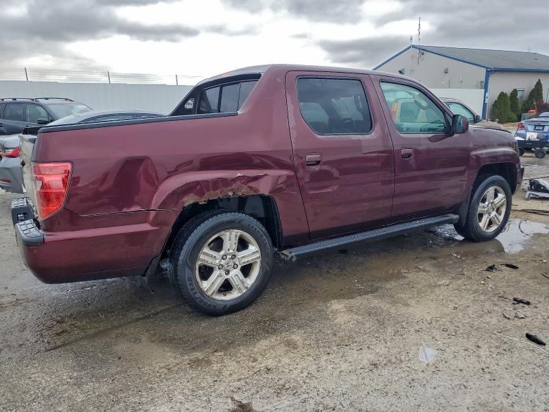 Photo 3 from auction – 2010 HONDA RIDGELINE with VIN 5FPYK1F58AB011523