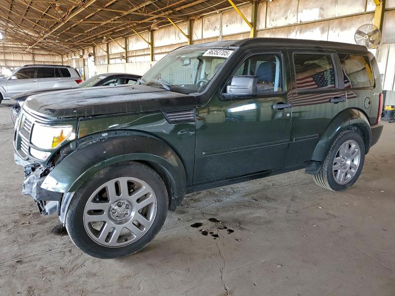 DODGE NITRO SXT 2010 with VIN 1D4PU5GX8AW125123 - Photo from auction