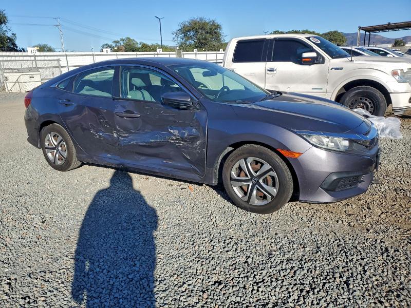 Photo 4 from auction – 2018 HONDA CIVIC LX with VIN 2HGFC2E57JH582291