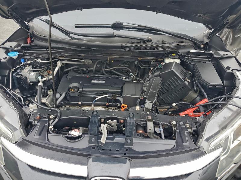 Photo 12 from auction – 2016 HONDA CR-V LX with VIN 2HKRM4H34GH613608