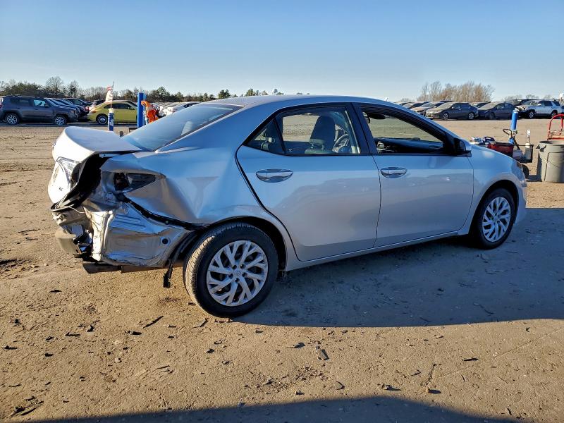 Photo 3 from auction – 2019 TOYOTA COROLLA L with VIN 5YFBURHEXKP864032