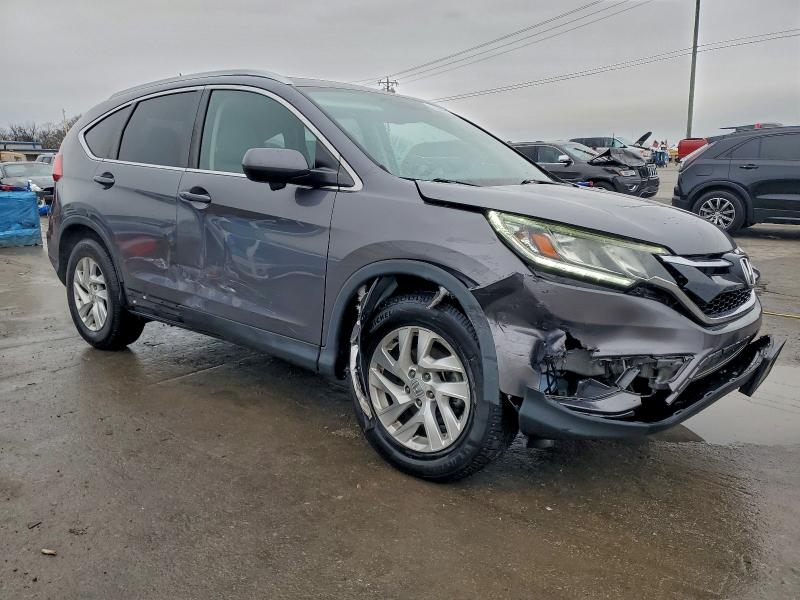 Photo 4 from auction – 2015 HONDA CR-V EXL with VIN 2HKRM3H79FH508090