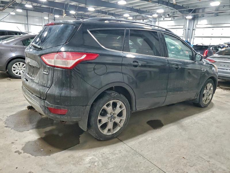 Photo 3 from auction – 2014 FORD ESCAPE SE with VIN 1FMCU9GX3EUE13356