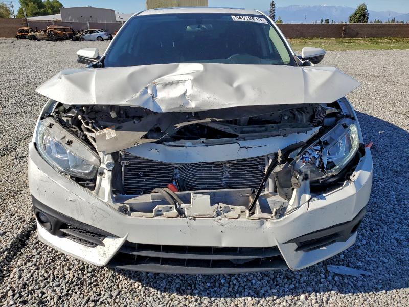 Photo 5 from auction – 2018 HONDA CIVIC with VIN JHMFC1F38JX007228