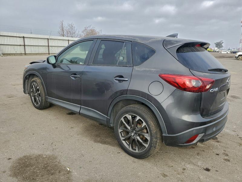 Photo 2 from auction – 2016 MAZDA CX-5 with VIN JM3KE2DY2G0669314