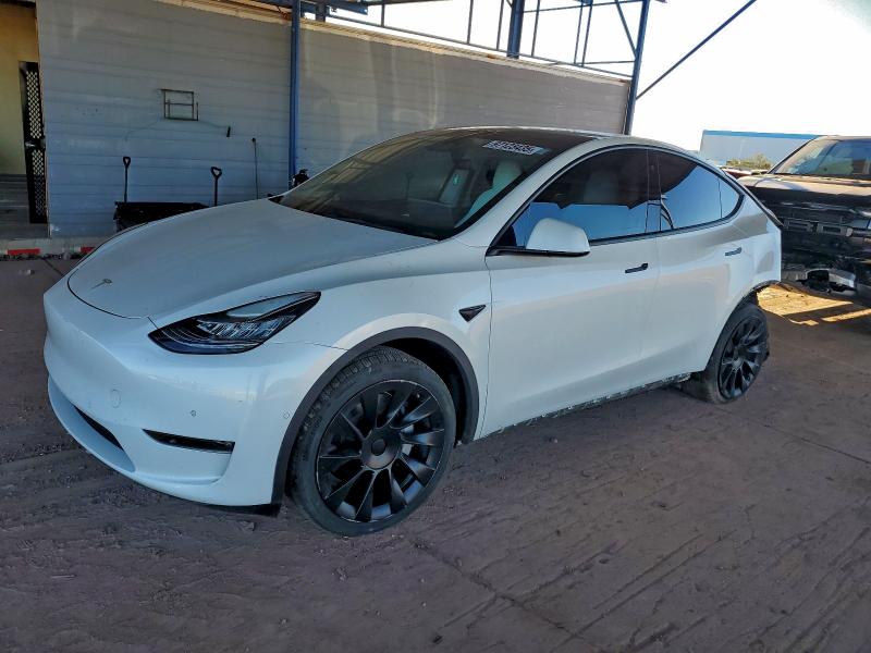 TESLA MODEL Y 2022 with VIN 7SAYGDEE7NF427939 - Photo from auction