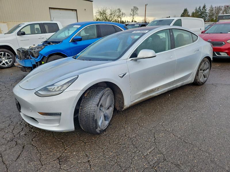 TESLA MODEL 3 2018 with VIN 5YJ3E1EAXJF041857 - Photo from auction