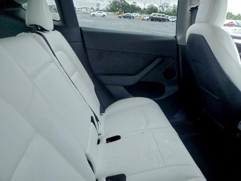 Photo 11 from auction – 2022 TESLA MODEL Y with VIN 7SAYGDEE7NF543674
